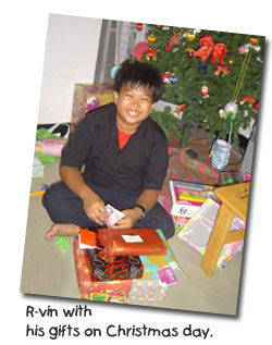 R-vin with his gifts on Christmas Day