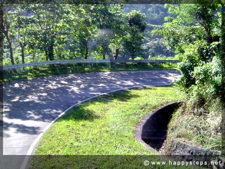 The winding road to San Carlos passing through the mountainous area of Don Salvador Benedicto route