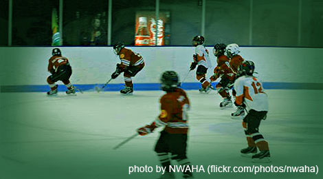 Kids playing ice hockey - photo by NWAHA (flickr.com/photos/nwaha)